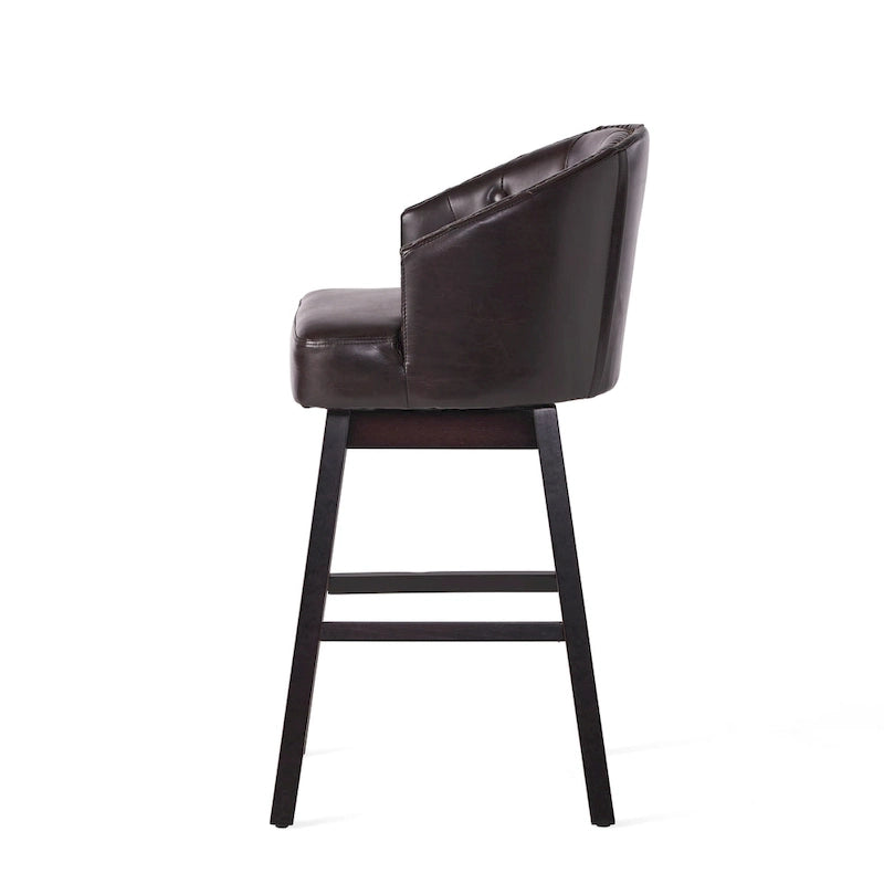Modern tufted rotating bar stools, adorned with rivets.