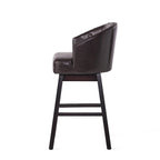 Modern tufted rotating bar stools, adorned with rivets.