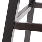 Modern tufted rotating bar stools, adorned with rivets.