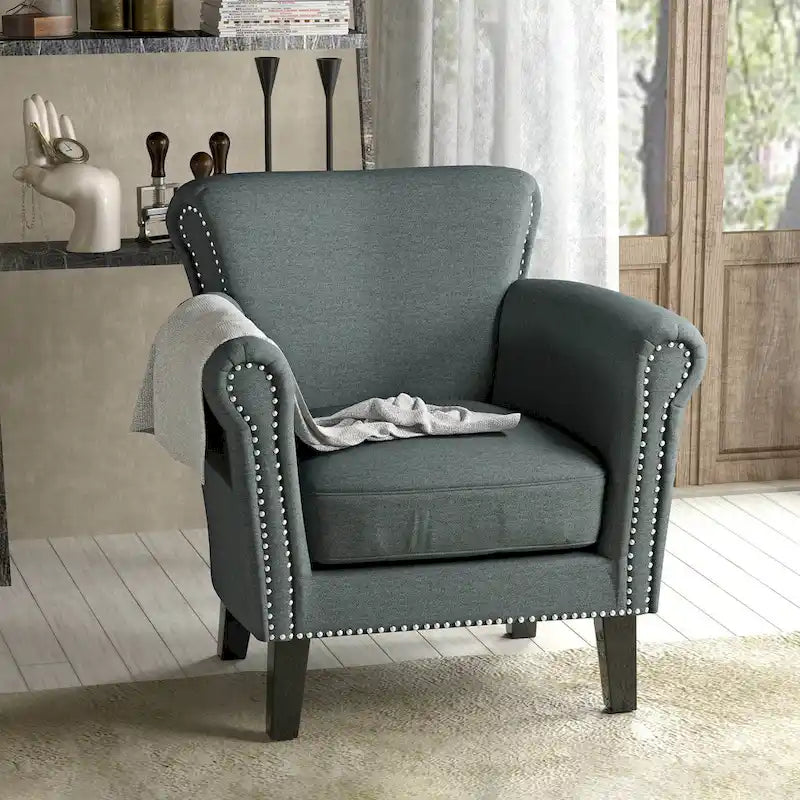 Modern roll-up club chair, adorned with rivet details