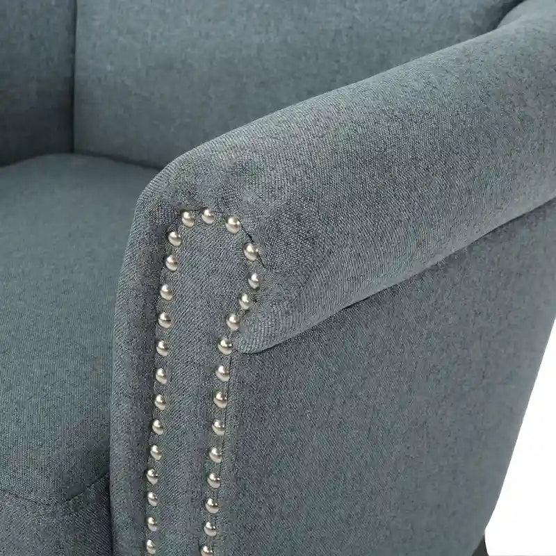 Modern roll-up club chair, adorned with rivet details