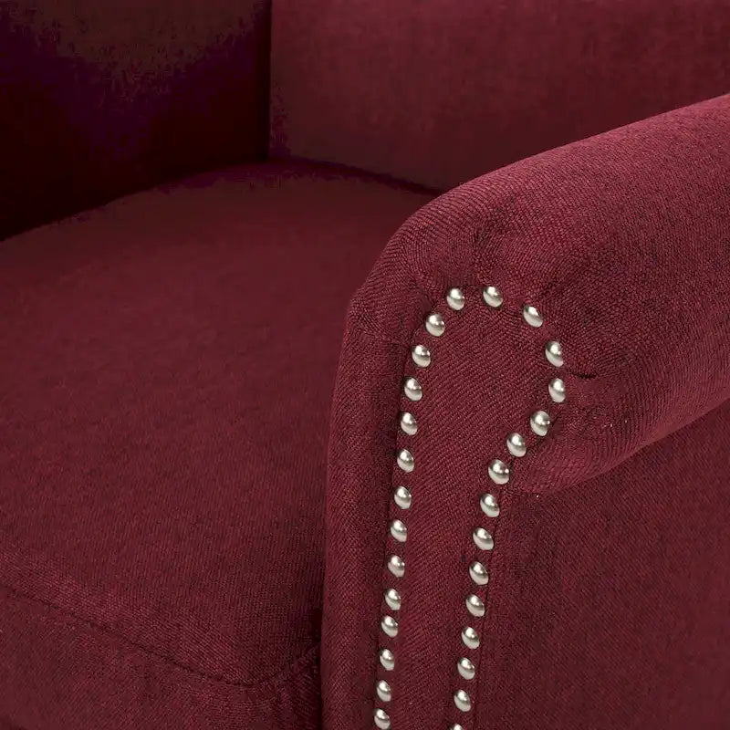 Modern roll-up club chair, adorned with rivet details