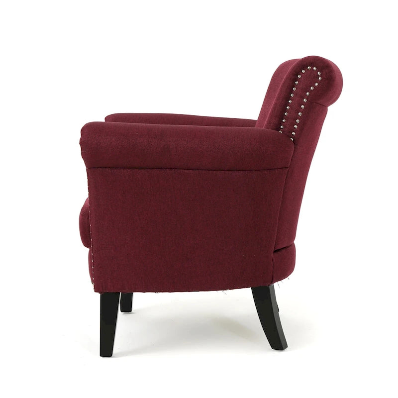 Modern roll-up club chair, adorned with rivet details