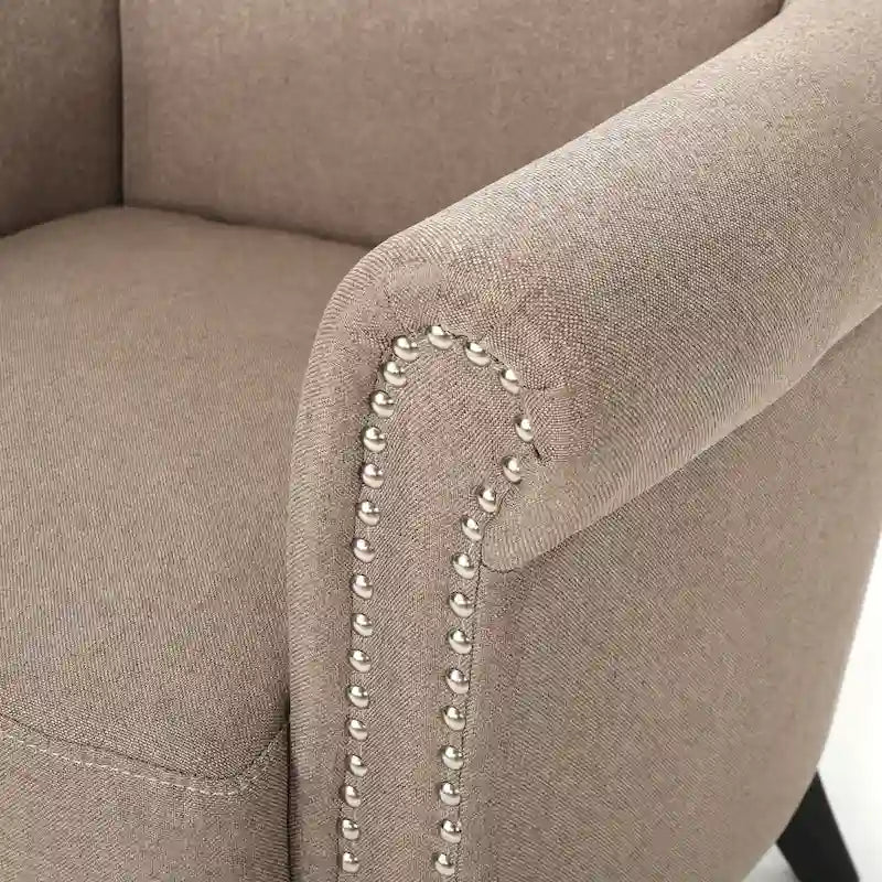 Modern roll-up club chair, adorned with rivet details