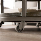 Industrial style round wooden coffee table with shelves